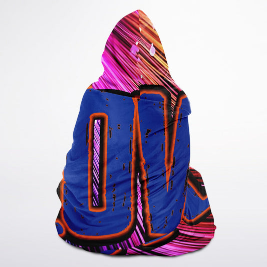 A hooded blanket with a vibrant multicolored light burst design and the word 'LOVE' in bold purple lettering on the front.