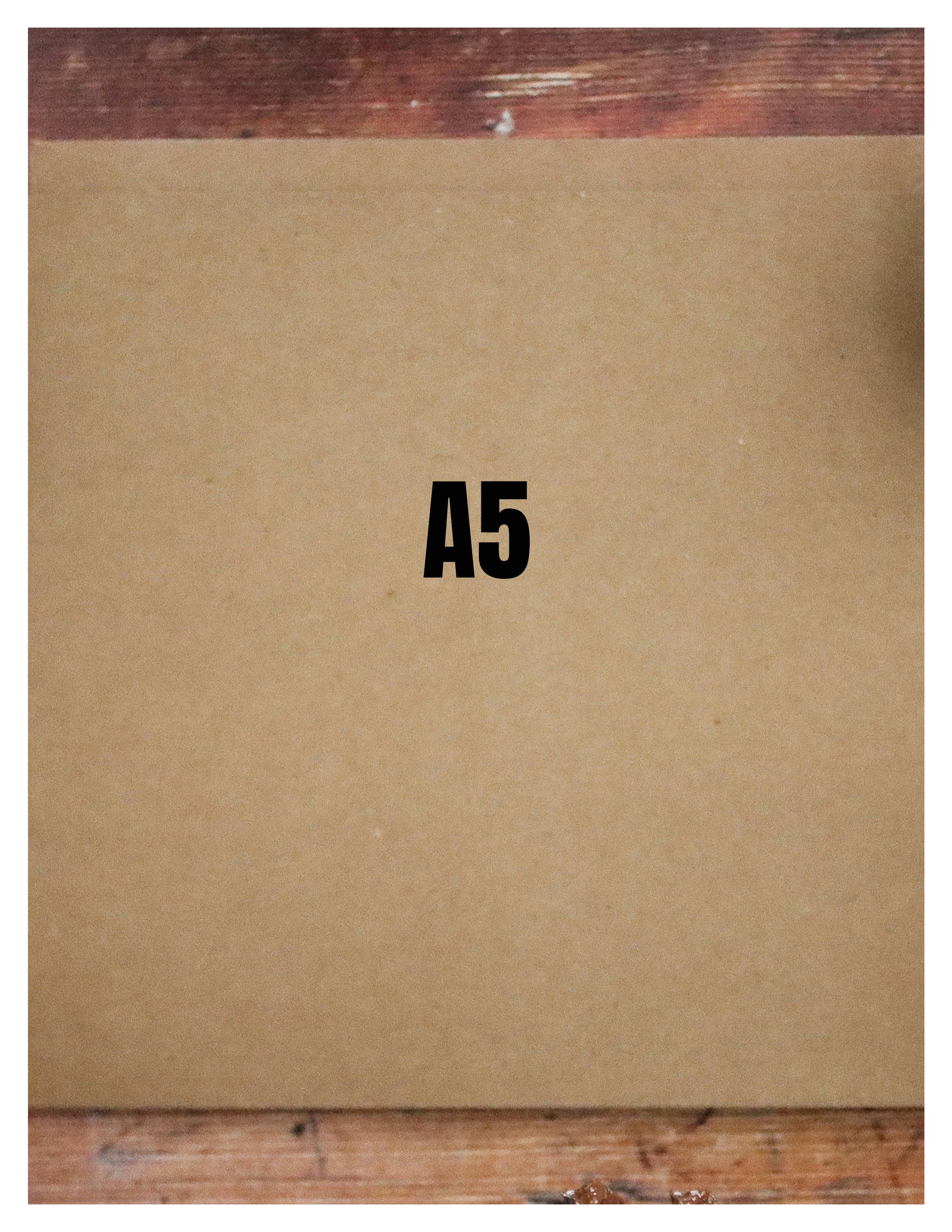 Brown cardboard box with 'A5' printed on it, placed on a wooden surface.
